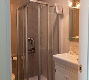 a bathroom with a shower and a sink at El Carmen in Toro +20 photos