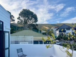 a view from the balcony of a house at Nomad City Suites in Cape Town