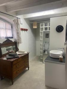 a large bathroom with a sink and a tub at le relais Perrusson, Bed and breakfast et camping à la tuilerie in Écuisses +57 photos