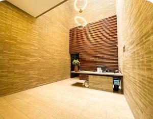 a hallway with a counter and a cat sitting in a room at Distrito prime 1-303 in Bogotá +12 photos