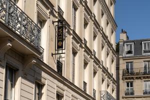 a building with a sign on the side of it at ELSA, Hôtel Paris by Collection Vesper in Paris
