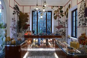 a lobby with a bar in a building at CASABIANCA Suites in Como