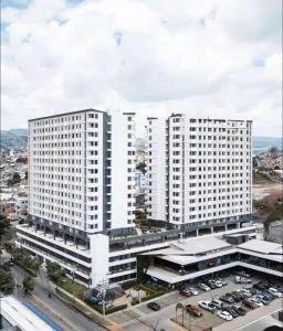 an overhead view of a large white building at Angies Loft in Tegucigalpa