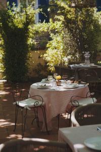a table with plates of food on top at LE CLOS DES ARÔMES in Cassis