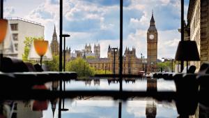 a view of big ben and big ben clock tower at Park Plaza London Westminster Bridge in London +157 photos