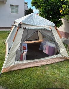 a tent sitting on the grass in a yard at Green Oasis Retreat in Bar