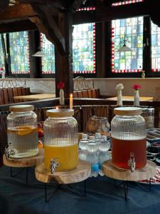 a group of jars of honey on display in a church at Hotel Main Taunus in Hochheim am Main