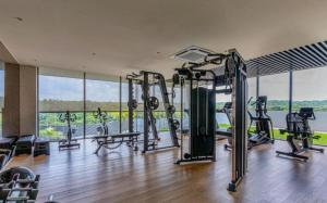 a gym with treadmills and cardio equipment in a building at Apartamento en Manzanillo con salida directa a la playa in Cartagena de Indias