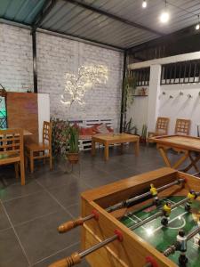 a large room with tables and a table with avertisementvertisementosateosateosateosate at JUMANA in Nazca