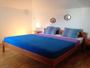 Posteľ alebo postele v izbe v ubytovaní Gala Apartments