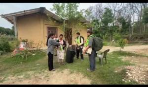 a group of people standing in front of a house at Gobrela homestay in Bardiyā