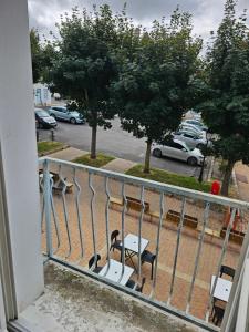 a balcony with a view of a parking lot at Studio in Bonny-sur-Loire