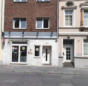 a store front of a building on a street at Appartement Klimaanlage WC in Mönchengladbach