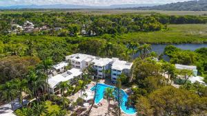 an aerial view of a resort with a swimming pool at Tropical Casa Laguna in Cabarete