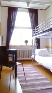 Postel nebo postele na pokoji v ubytování Gafsele Lappland Hostel