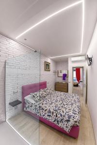 Кровать или кровати в номере Modern Apartment near Colosseum