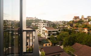 a view of a city from a window at Velora Hotel DaLat in Xuan An +94 photos