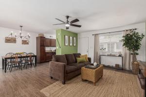 a living room with a couch and a table at RUDRASAI 2611-Tempe,AZ in Tempe