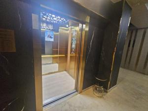 an empty refrigerator is in a room with at NATALIA - Building Stefan Resort II in Năvodari