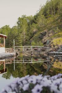 a wooden bridge over a body of water at Zicka plaza in Kraljevo