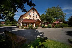 a building with a sign in front of it at Landgasthof Paradies in Frickingen