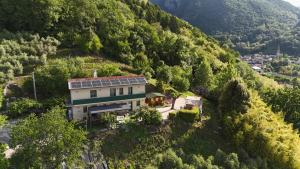 a house on the side of a mountain at L’Oro di Nonna Adele in Nimis