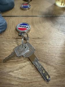 a pair of keys on top of a table at Apartment 98A7 in Povljana