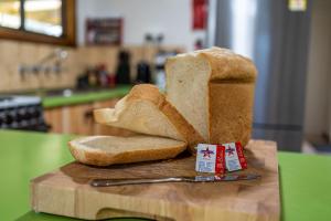 a loaf of bread sitting on a cutting board at Hawker Bed and Breakfast in Hawker +60 photos