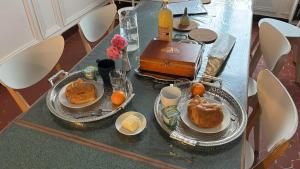 a table with two plates of food on it at QG Marseille in Marseille