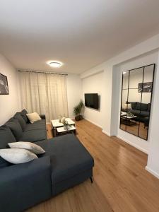 a living room with a couch and a table at Panorama Krizevac in Međugorje