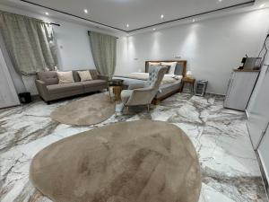 a living room with a couch and a table at Eliasar1 in Linz