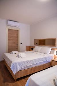 a bedroom with two beds at Sunmed Lodge in Oludeniz