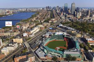 an aerial view of a baseball field in a city at Fenway Park Brownstone in Boston