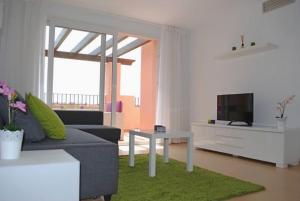 TV a/nebo společenská místnost v ubytování Zeer trendy penthouse op de Mar Menor Golf & Padel Resort