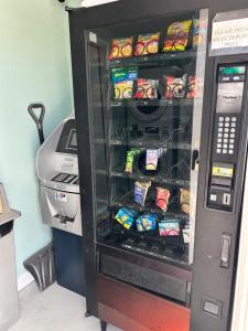 an atm machine with food inside of it at Snowy Mountain Inn in Saratoga