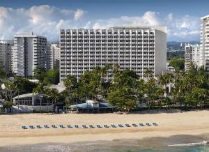 a view of a hotel from the beach at The Royal Sonesta San Juan in San Juan