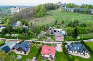 an aerial view of a house with a yard at Ostań i Odpocznij Podzamcze in Podzamcze