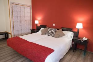 Postel nebo postele na pokoji v ubytování Hotel Venta Magullo