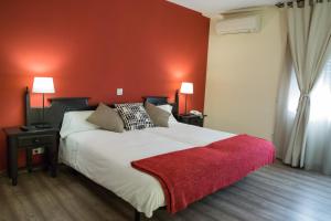 Postel nebo postele na pokoji v ubytování Hotel Venta Magullo