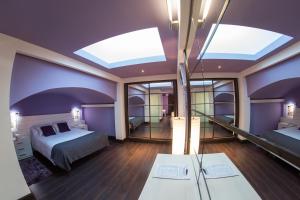 Postel nebo postele na pokoji v ubytování Hotel Venta Magullo