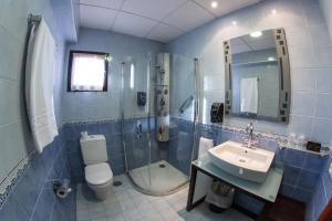 Koupelna v ubytování Hotel Venta Magullo