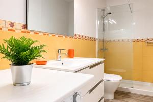 a bathroom with a sink and a toilet and a shower at La Casita del Sur, Abades in Abades +26 photos