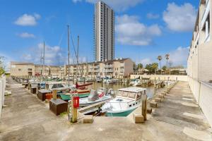 a bunch of boats are docked in a marina at Mariner Village 108 in Seabrook