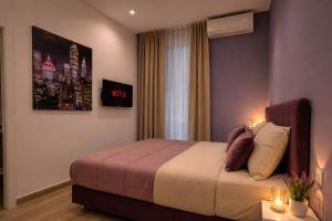 a hotel room with a bed and a window at Relais Principe Umberto in Naples +30 photos
