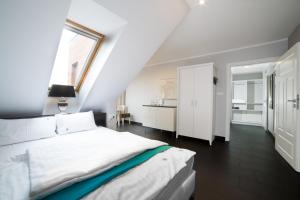 Postel nebo postele na pokoji v ubytování HOTEL Amber Suite & SPA - Enklawa dla Dorosłych
