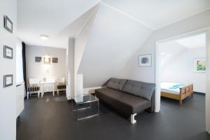 Posezení v ubytování HOTEL Amber Suite & SPA - Enklawa dla Dorosłych