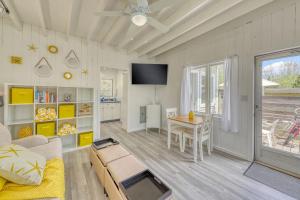 a living room with a couch and a table at The Surfcomber Unit 1 in Ocean Bay Park