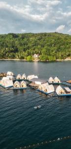 a group of boats parked in the water at Reef Resort - Mount Apo View Unit B2 in Kaputian