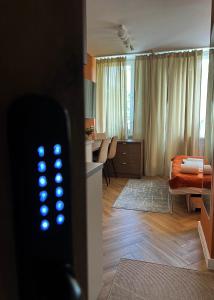 a view of a room with a bedroom and a living room at Velvet Studio in Zamość