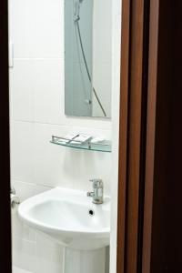 a bathroom with a sink and a mirror at Алматы Транзит №1 in (( Turksib )) +89 photos